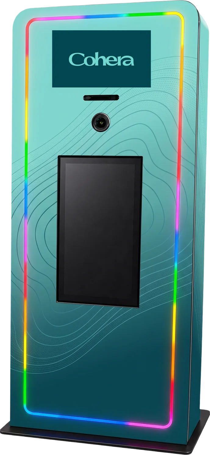 Elevated Kiosk with LED edge lighting, large touch screen, and integrated printer, shown in a Cohera custom wrap